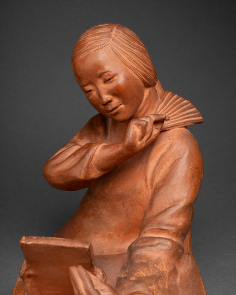 Gaston HAUCHECORNE (1880-1945) 'Asian woman with fan and book', Patinated terracotta, Art Deco period.