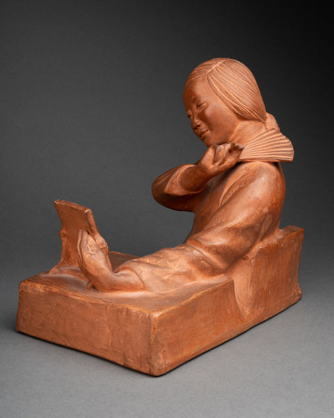 Gaston HAUCHECORNE (1880-1945) 'Asian woman with fan and book', Patinated terracotta, Art Deco period.