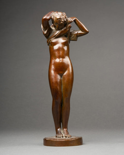 Maurice DELANNOY (1885-1972) 'Jeune femme se dénudant' Bronze patiné, période Art Déco.