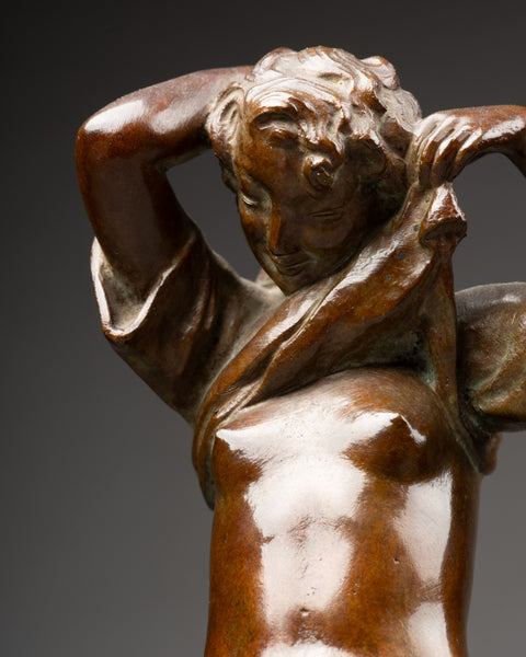 Maurice DELANNOY (1885-1972) 'Jeune femme se dénudant' Bronze patiné, période Art Déco.