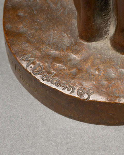 Maurice DELANNOY (1885-1972) 'Jeune femme se dénudant' Bronze patiné, période Art Déco.