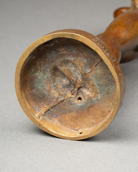 Maurice DELANNOY (1885-1972) 'Jeune femme se dénudant' Bronze patiné, période Art Déco.