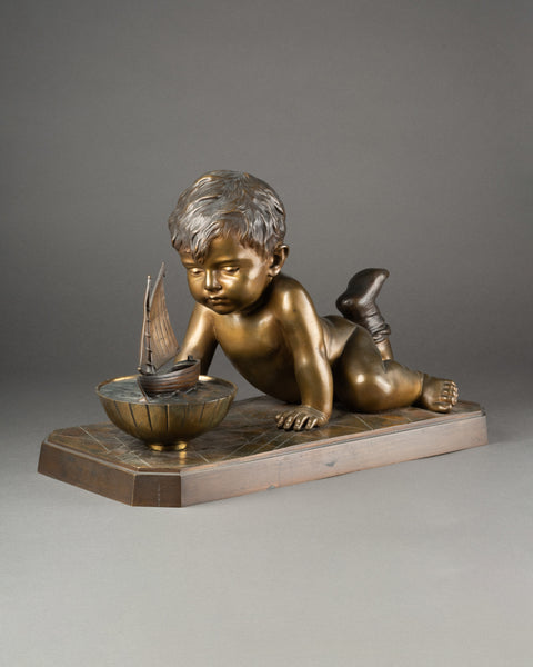 Emmanuel VILLANIS (1858-1914) Enfant jouant avec un bateau. Grand et rare bronze. Vers 1900