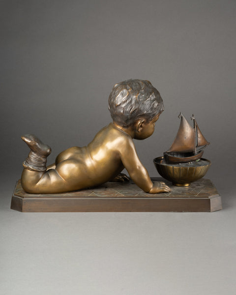 Emmanuel VILLANIS (1858-1914) Enfant jouant avec un bateau. Grand et rare bronze. Vers 1900