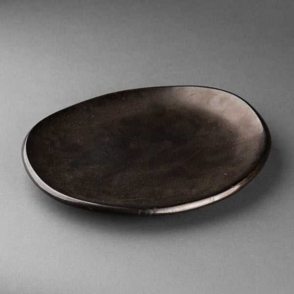 Atelier MADOURA - Coupe oblongue en céramique émaillée couverte noire