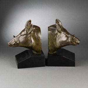 Georges GARREAU (1885-1955) - Paire de serre-livres 'têtes de sanglier' - Bronzes Art Déco