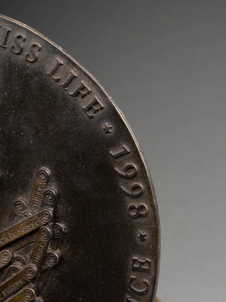 ARMAN 'La Main Tendue' - Patinated bronze medallion