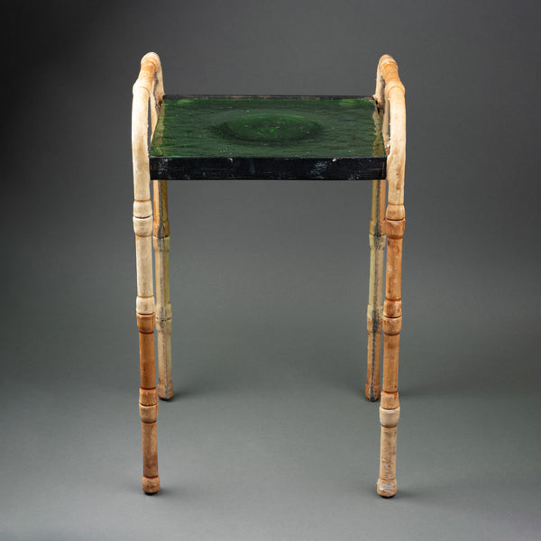 Jacques ADNET (1900-1984) Petit guéridon en métal et cuir sellier surpique couleur bambou,Vers 1950