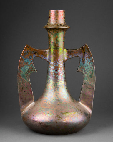 Clément MASSIER '1844-1917) Earthenware double grip vase with iridescent glaze, butterfly decoration.