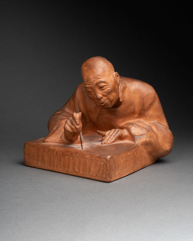 Gaston HAUCHECORNE (1880-1945) 'Personnage asiatique calligrahiant', Epreuve en terre cuite, période Art Déco.