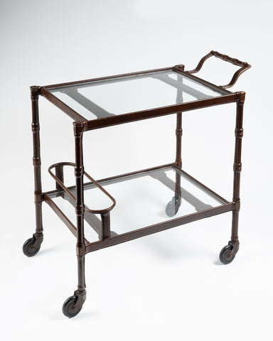 Jacques ADNET (1900-1984) Rolling trolley in 'chocolate' leatherette. France, circa 1960