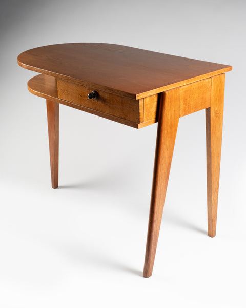 Jacques ADNET (1900-1984) Small oak tripod desk with sliding drawer