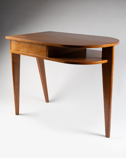 Jacques ADNET (1900-1984) Small oak tripod desk with sliding drawer