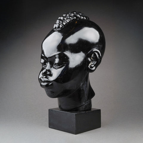 Ricardo SCARPA (1905-1999) Head of a young African, Patinated plaster with black varnish, Art Deco period.