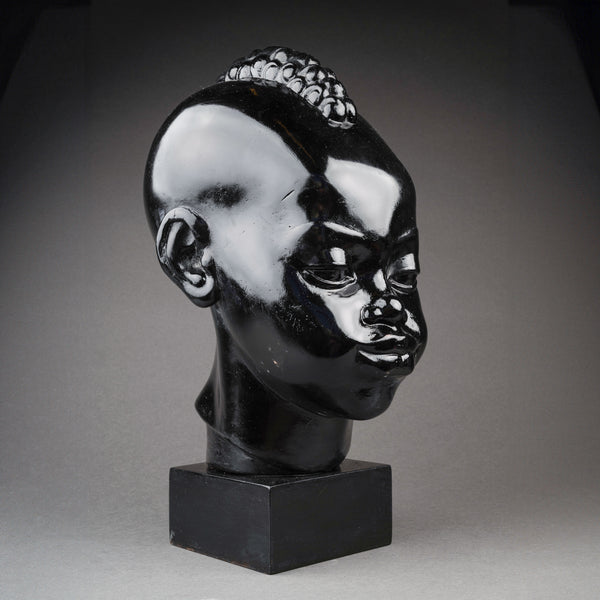 Ricardo SCARPA (1905-1999) Head of a young African, Patinated plaster with black varnish, Art Deco period.