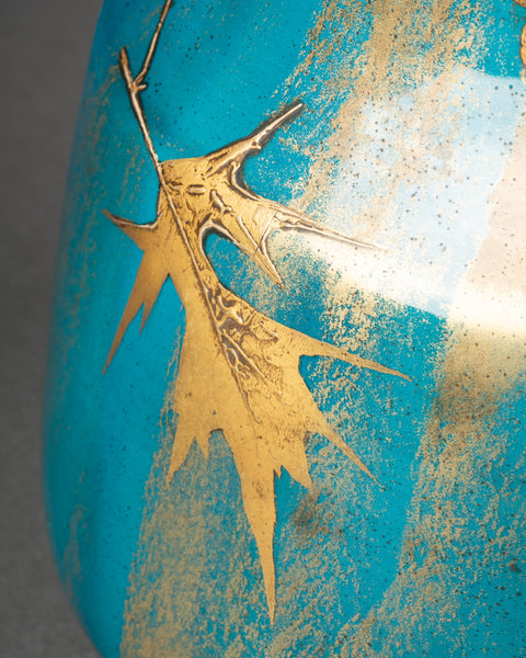 Clément MASSIER et L. LEVY - Bel ensemble de 3 vases en céramique émaillée sur fonds bleu, décor à l'or.