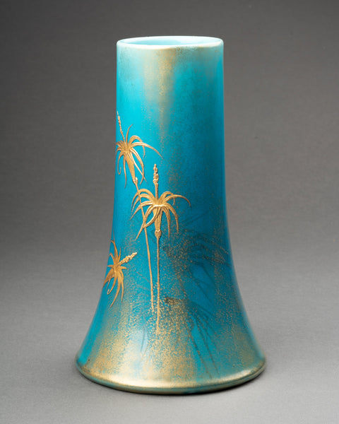 Clément MASSIER et L. LEVY - Bel ensemble de 3 vases en céramique émaillée sur fonds bleu, décor à l'or.