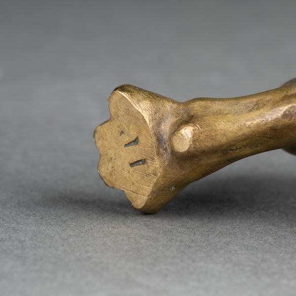 Pair of gilded bronze candlesticks, decorated with lizards, lions, and bunches of grapes, late 19th century.