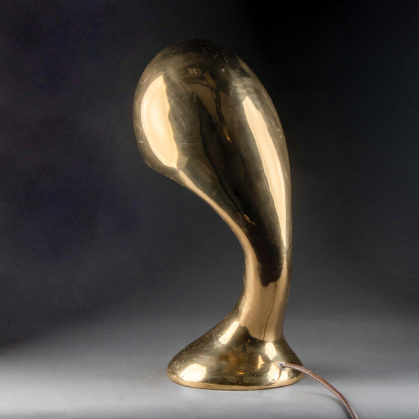 Exceptional modernist "drop" table lamp in polished bronze.
