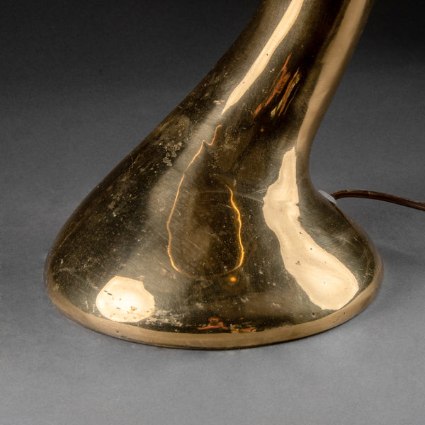 Exceptional modernist "drop" table lamp in polished bronze.