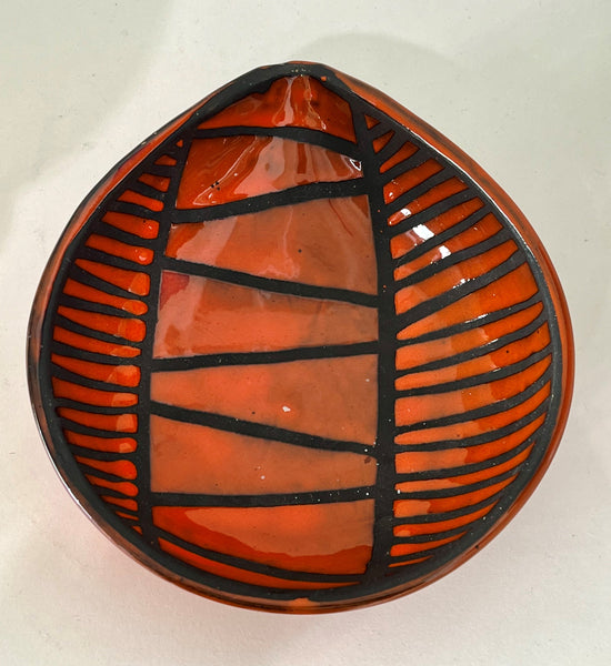 Roger CAPRON - Red enameled ceramic tripod bowl with black striped decoration. Circa 1950