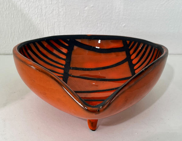 Roger CAPRON - Red enameled ceramic tripod bowl with black striped decoration. Circa 1950