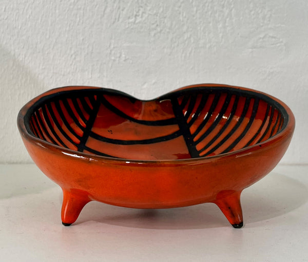 Roger CAPRON - Red enameled ceramic tripod bowl with black striped decoration. Circa 1950